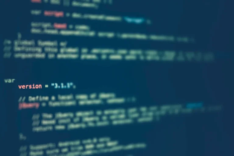 Close-up of code on a screen while debugging schema markup errors
