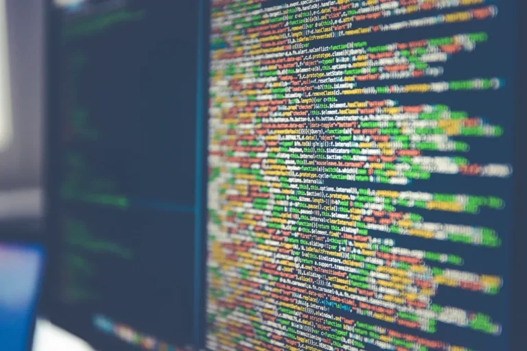 Colourful structured code on a monitor, representing JSON-LD examples