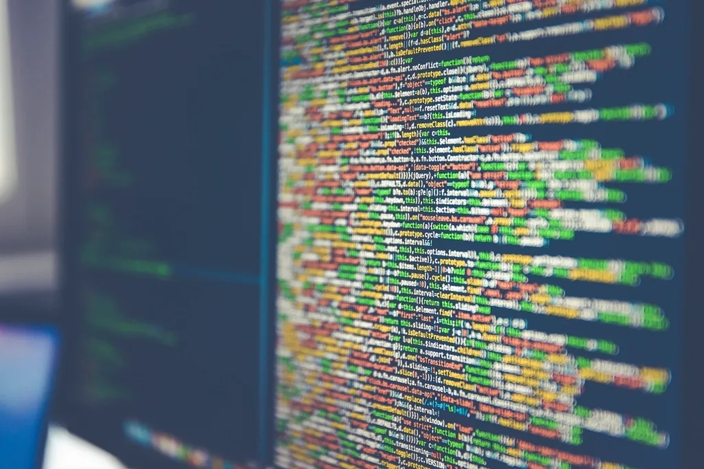 Colourful structured code on a monitor, representing JSON-LD examples