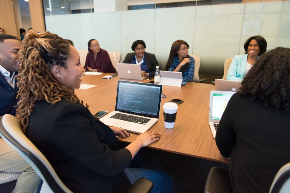 Marketing team reviewing a professional SEO audit in a meeting
