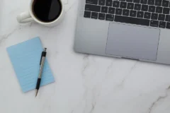 Top-down view of a laptop workspace used for page-level SEO checks in Chrome